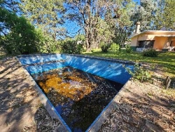 CASA EN VENTA EN PARQUE SIQUIMAN A 100 MTS DE LA RUTA 38. HERMOSO ENTORNO Y GRAN PARQUE