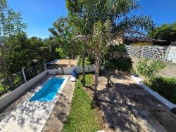 BELLA CASA EN VENTA EN VILLA CARLOS PAZ, CON PILETA, Bº Villa del Lago, Residencial, con excelente vista panorámica.