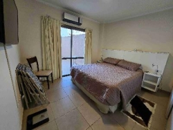 EXCELENTE DEPARTAMENTO EN VENTA EN CARLOS PAZ, 2 DORMITORIOS, FRENTE CON BALCÓN A LA CALLE + Patio Propio. EDIFICIO OLIVOS 4